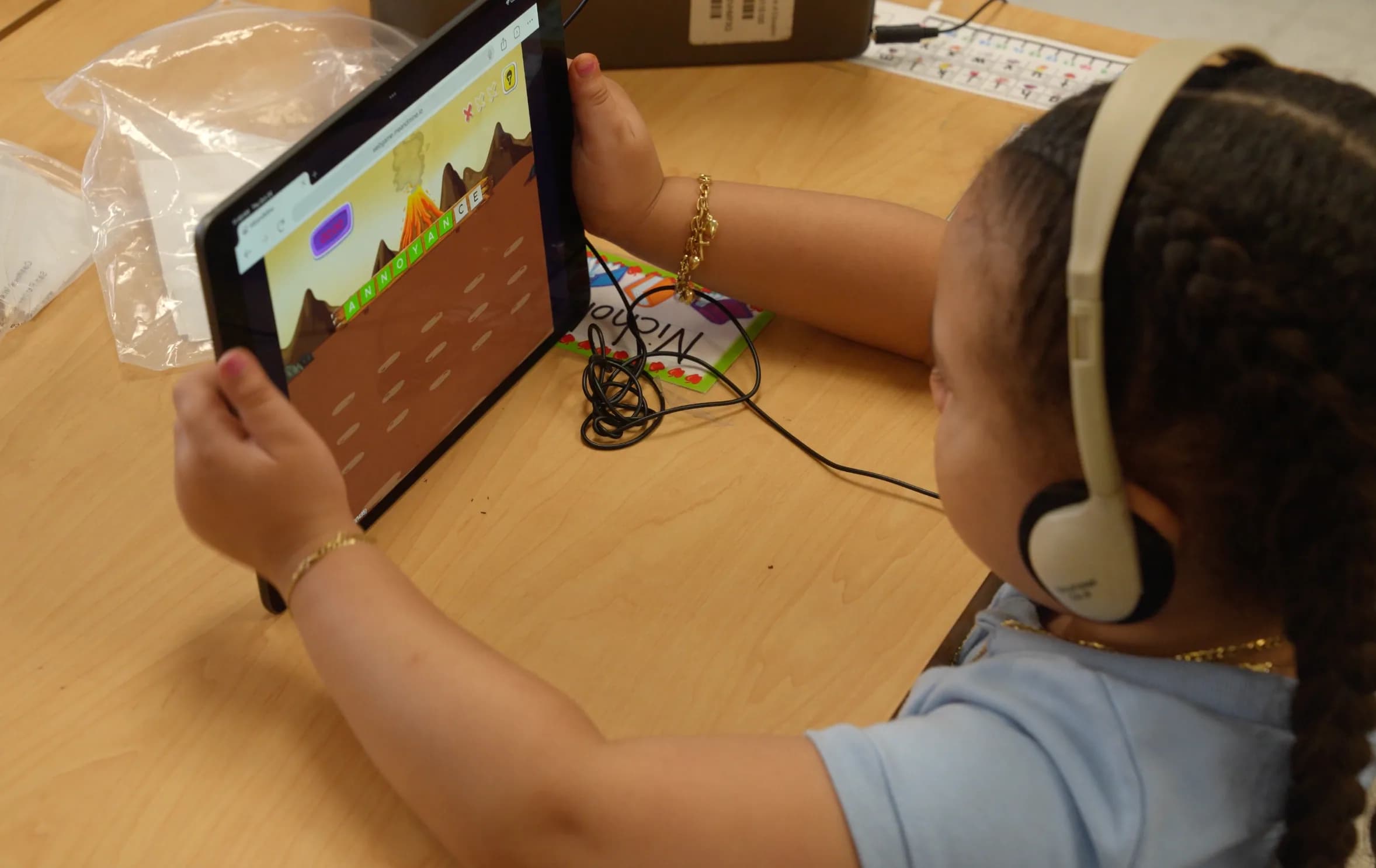 A child building an emotion robot from dough