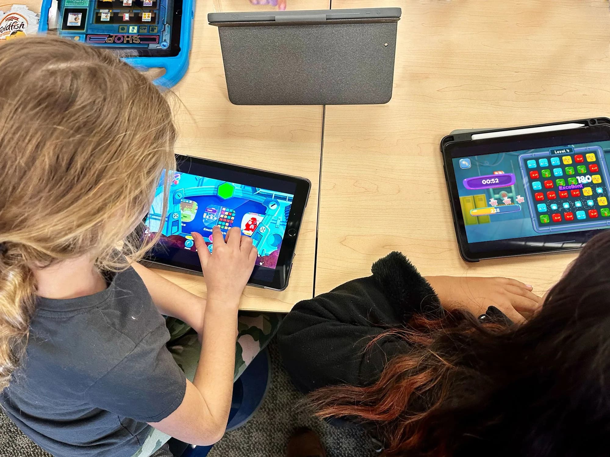 Students using MEandMine on tablets
